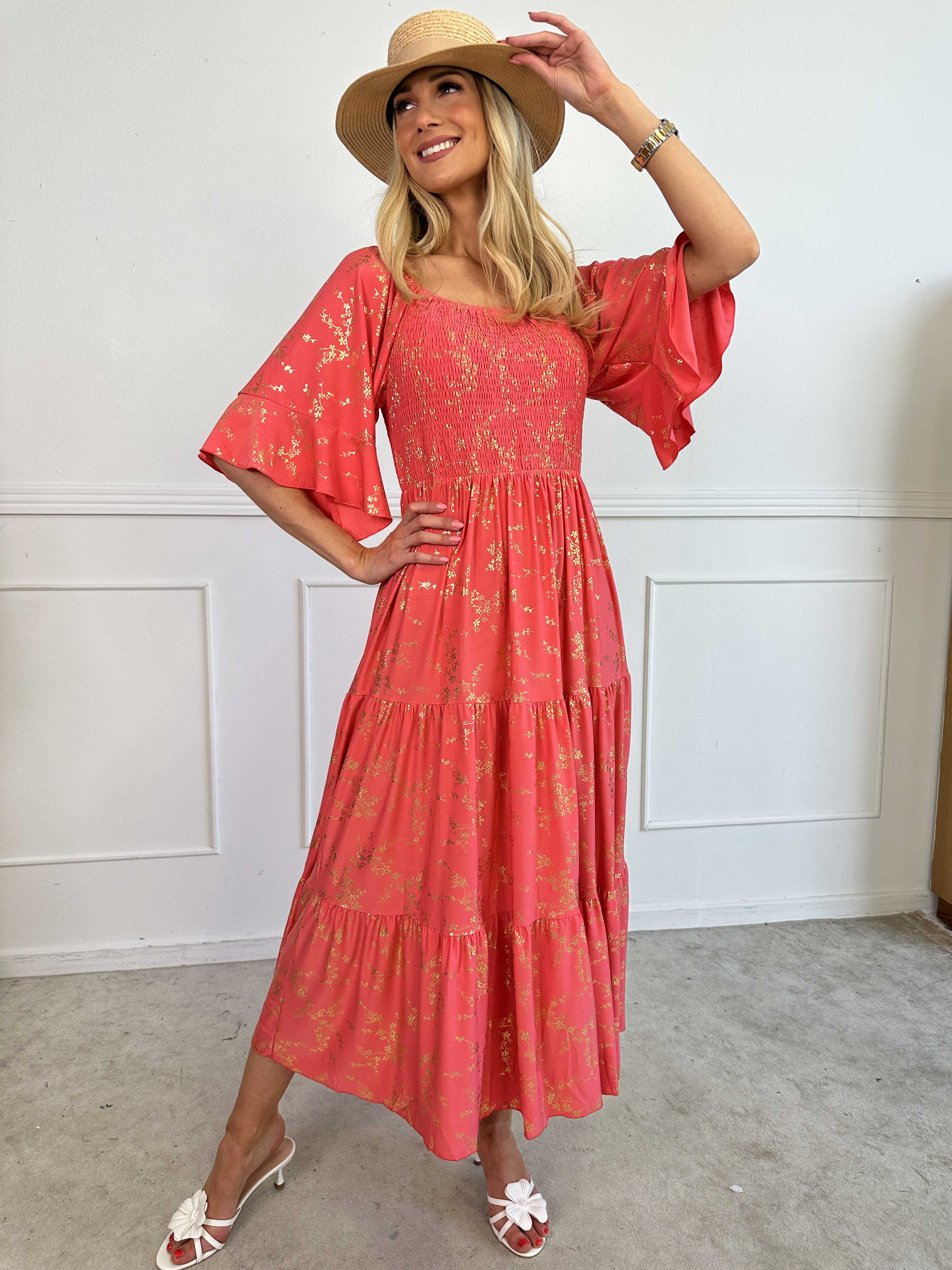 Elna Gold - Ensfarvet elastisk kjole med smock og guld print